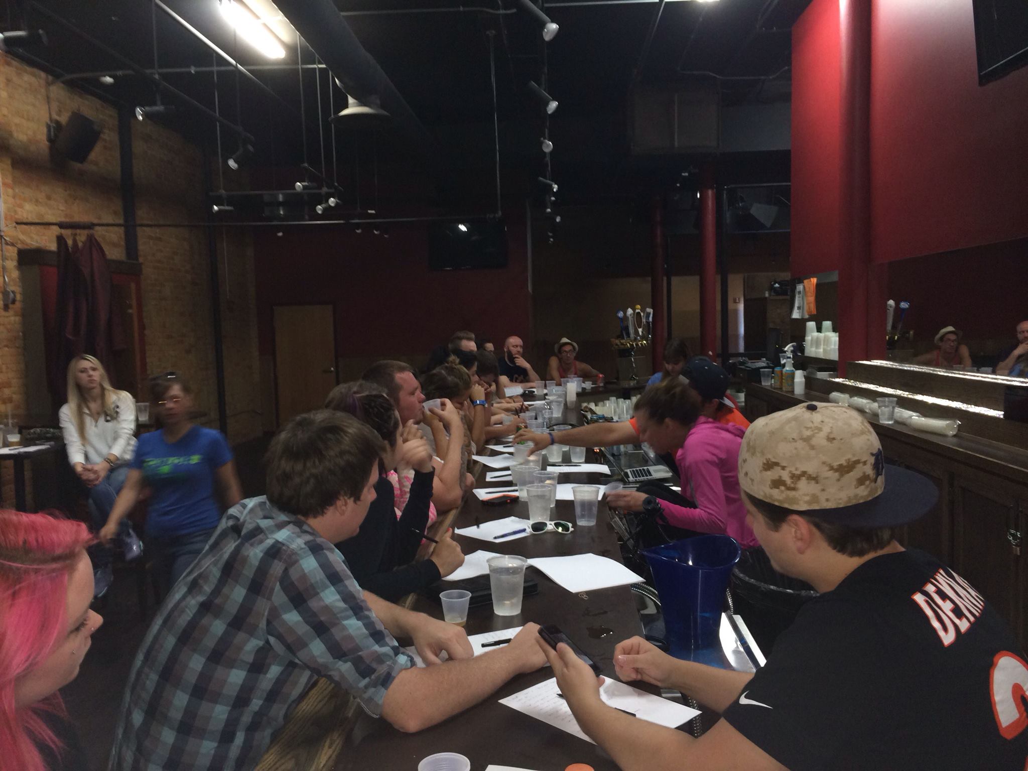 Long bar seating for trivia night at Tin Can Bar.
